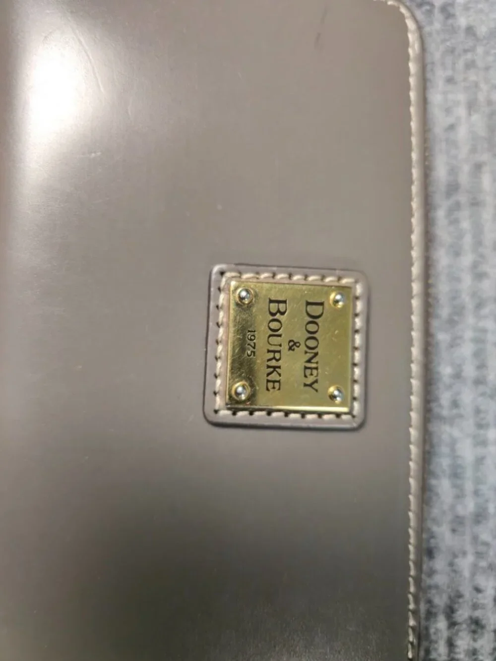 Dooney & Bourke Gray Leather Zip Around Wallet | Gold Logo Plaque